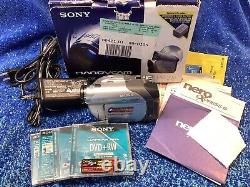 Sony Handycam DCR-DVD105 Camcorder PRISTINE New Battery 4 Discs Cords Manual